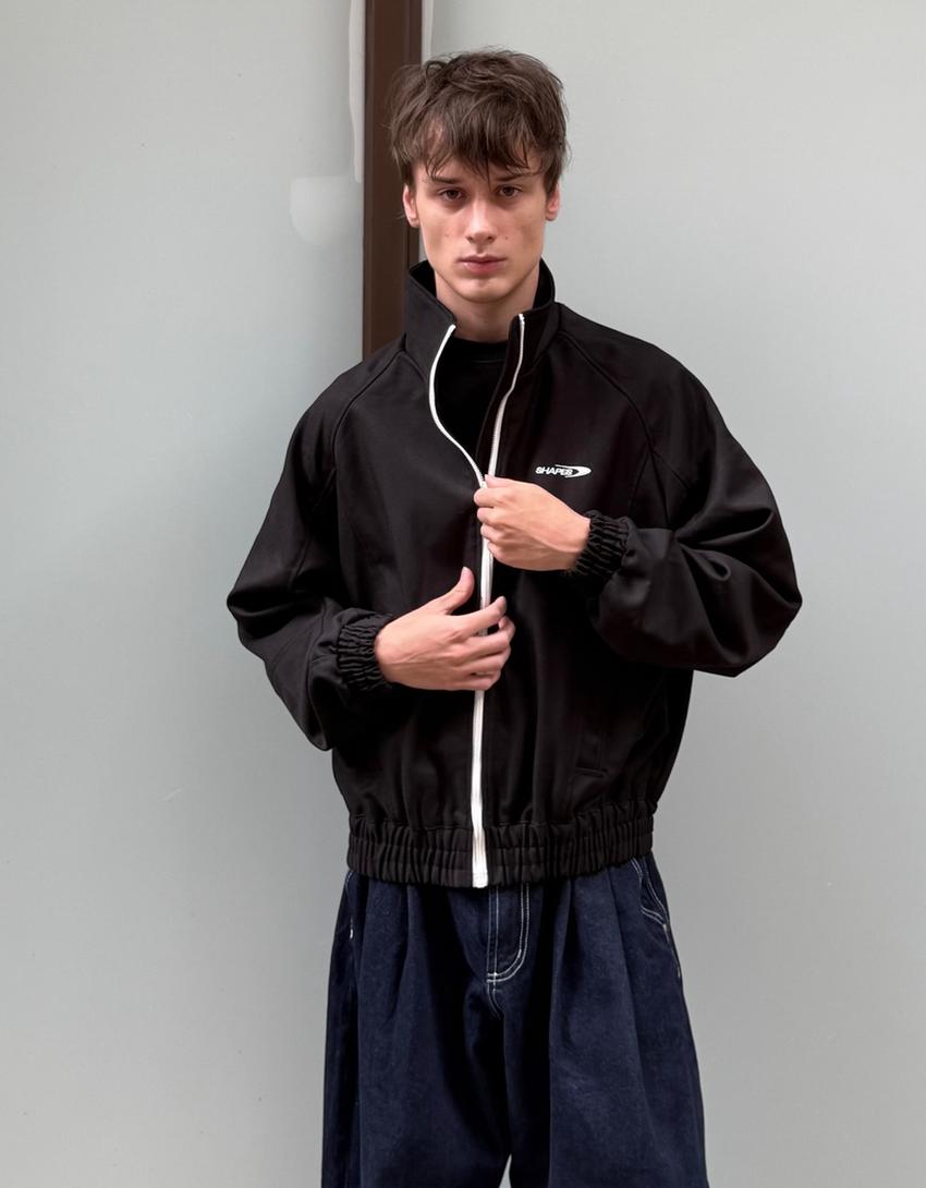 Jack met print en rits-Zwart