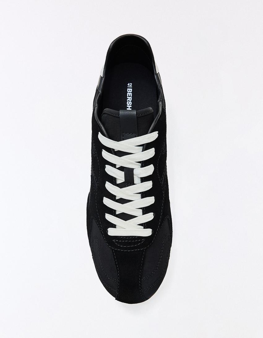 BUTY SPORTOWE RETRO NA CIENKIEJ PODESZWIE-Czarny