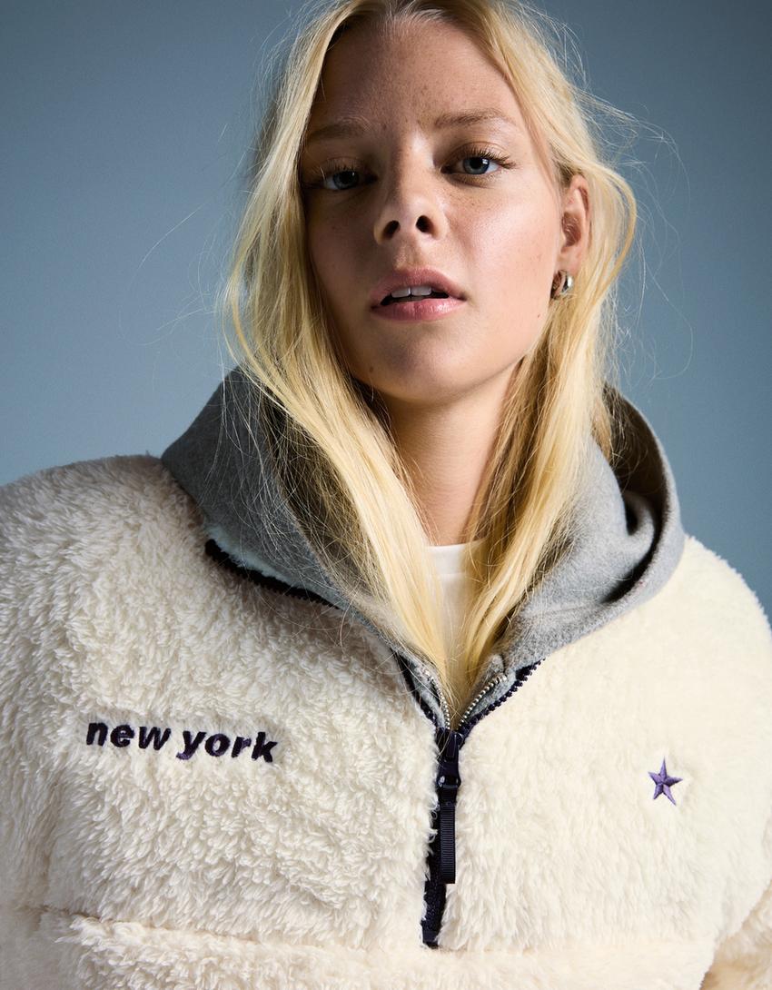 سويتر بسحّاب وتأثير فرو الغنم وحافة سفلية قابلة للتعديل-كريمي