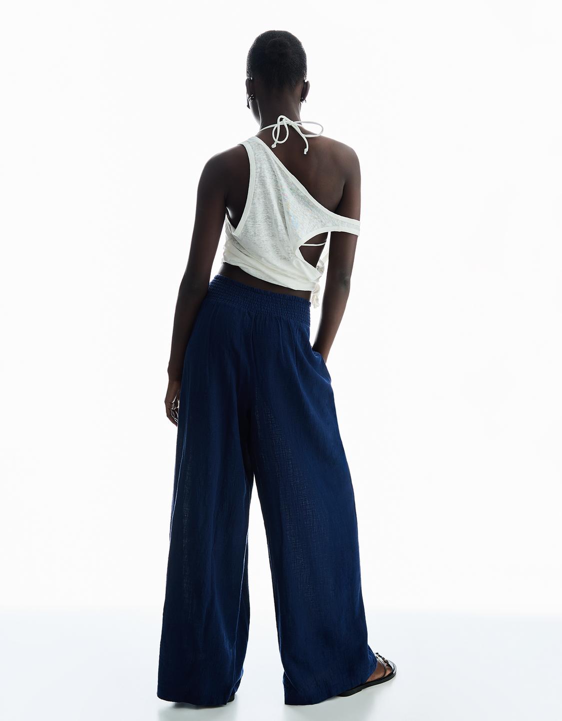 Wide-leg rustic trousers with darts