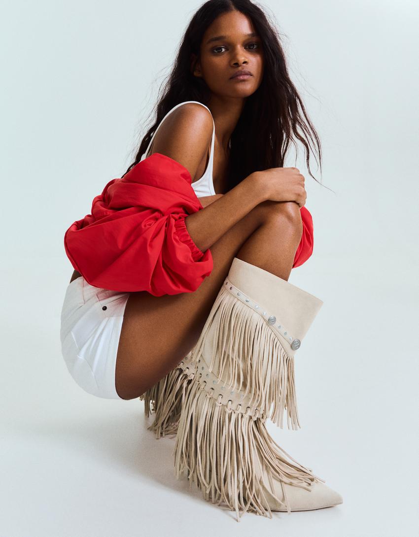 Heeled boots with fringes-BEIGE
