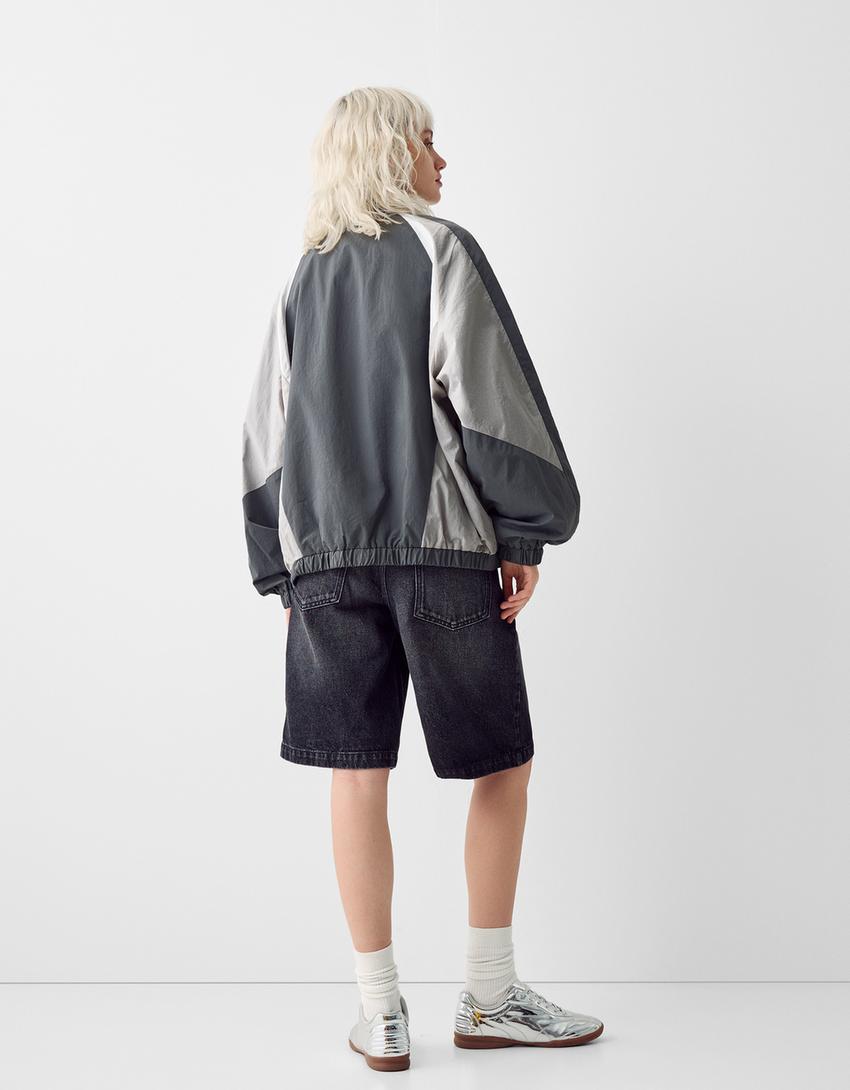 جاكيت تقني بكتل لونية-رمادي داكن-1