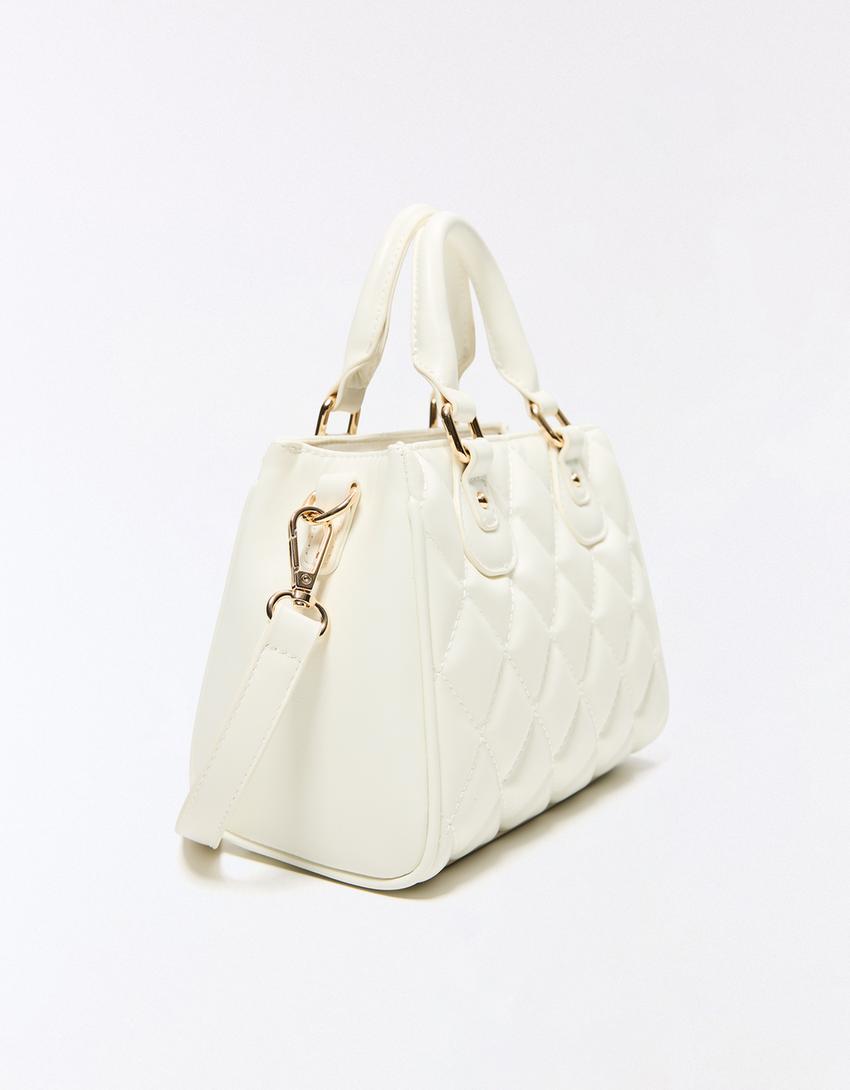 Stepptasche-Grbrochenes Weiss