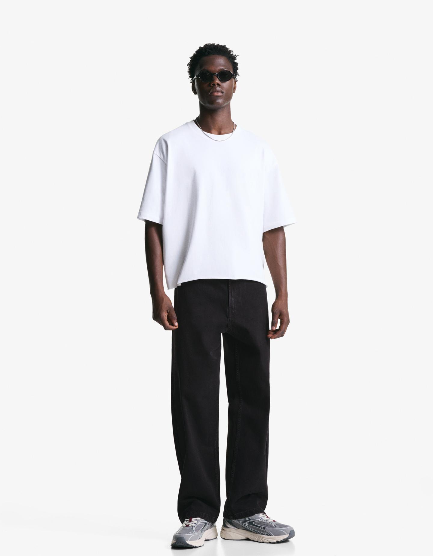 Bershka jeansy o kroju baggy czarny
