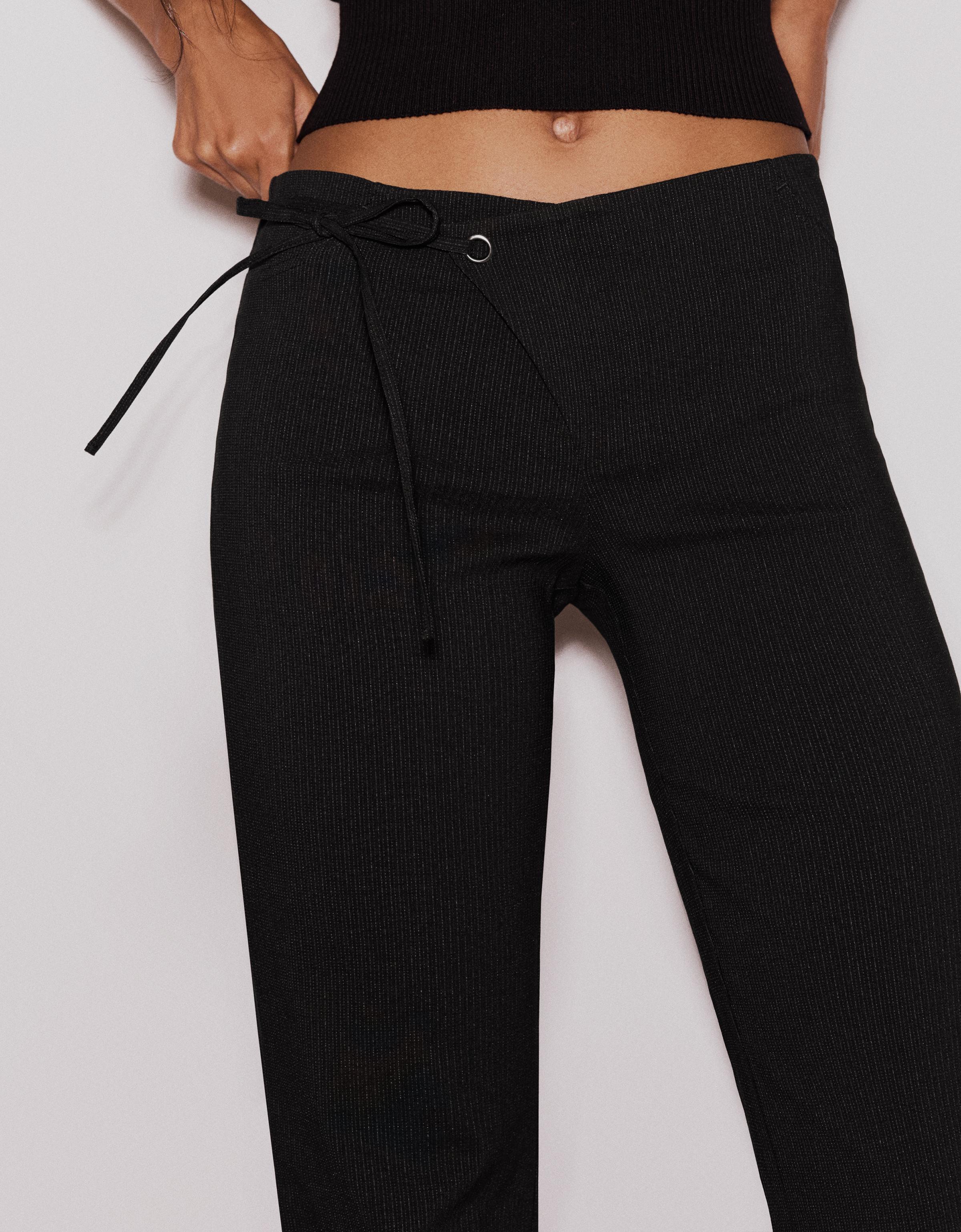 Low-rise flared trousers — Black