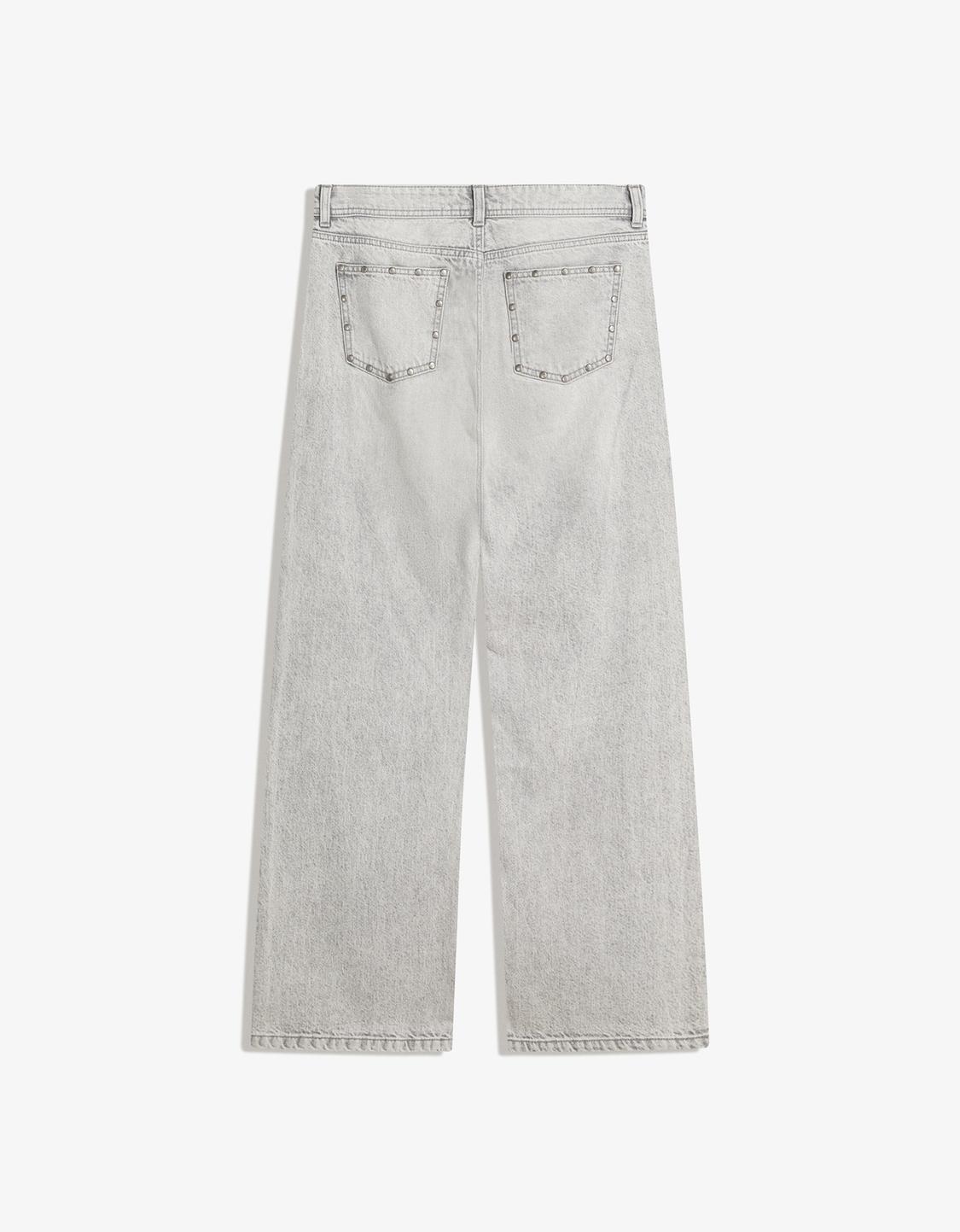 Baggy jeans with stars and studs