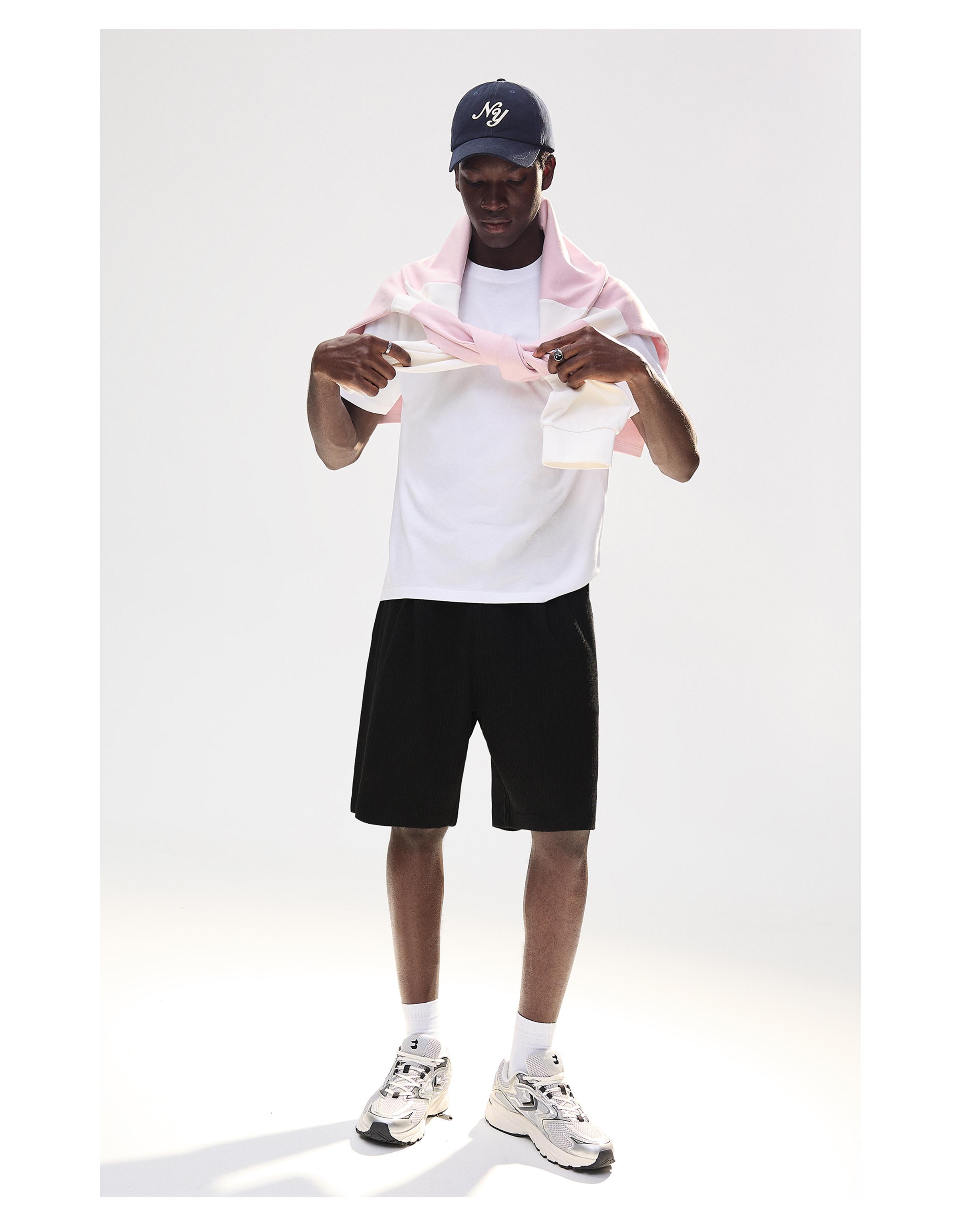 Textured plush Bermuda shorts — Black