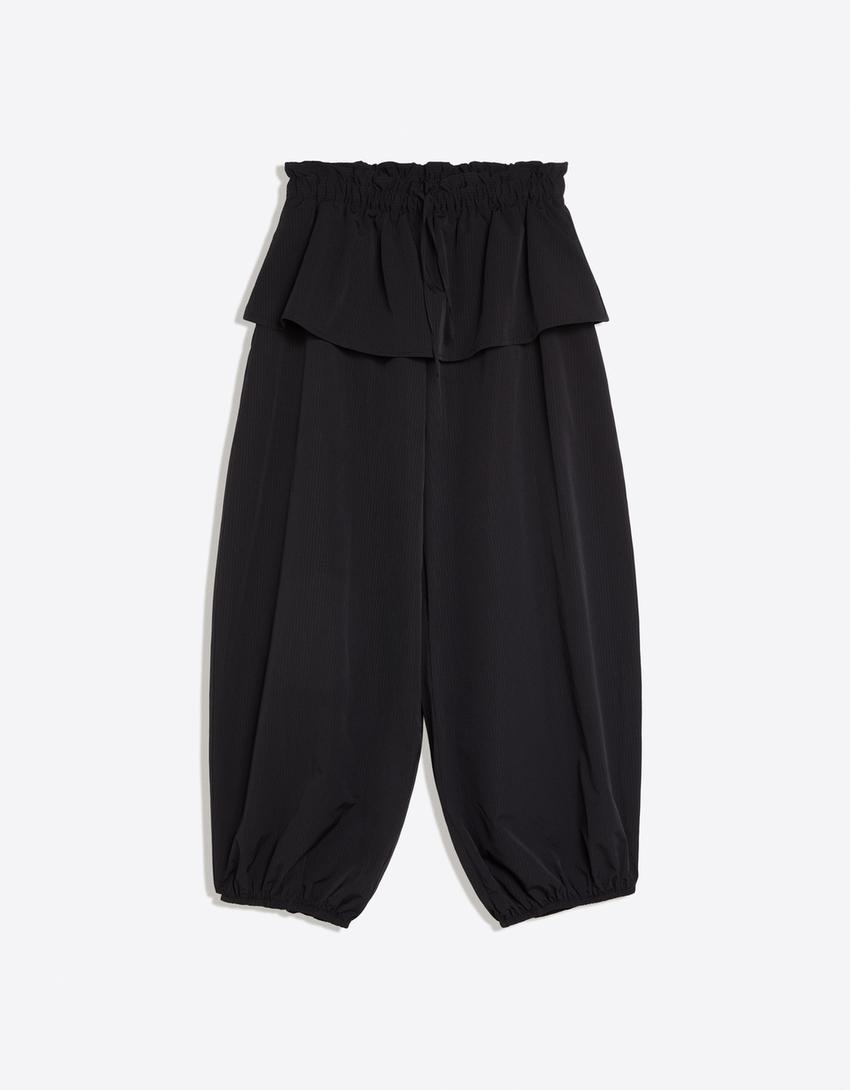 Peplum detaylı teknik pantolon-Siyah