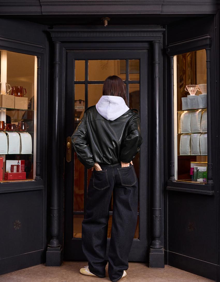 Caçadora efecte pell globus-Negre