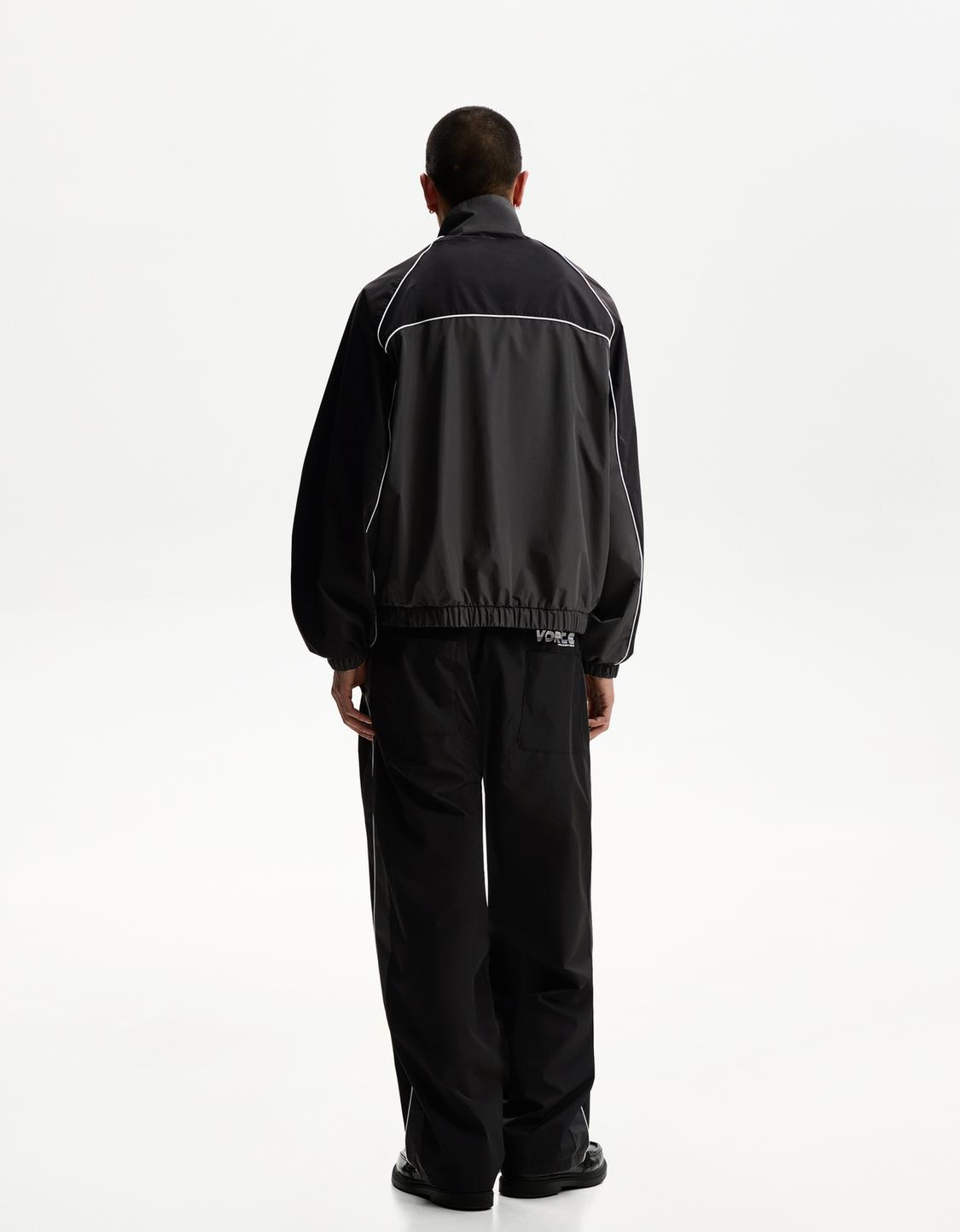 Technical trousers with sporty trim