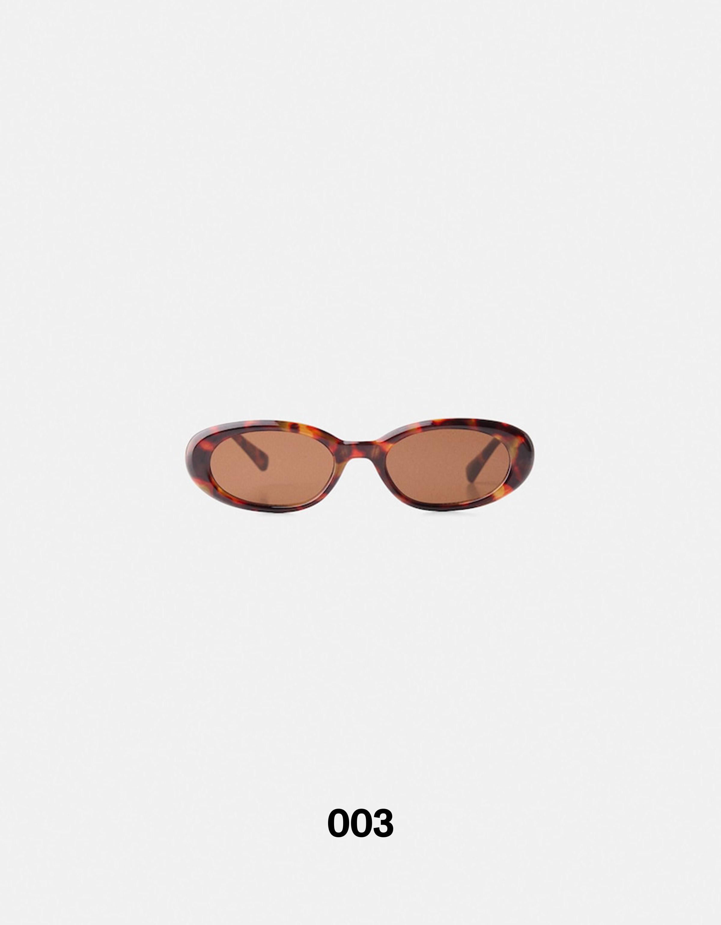 Tortoiseshell sunglasses — Brown