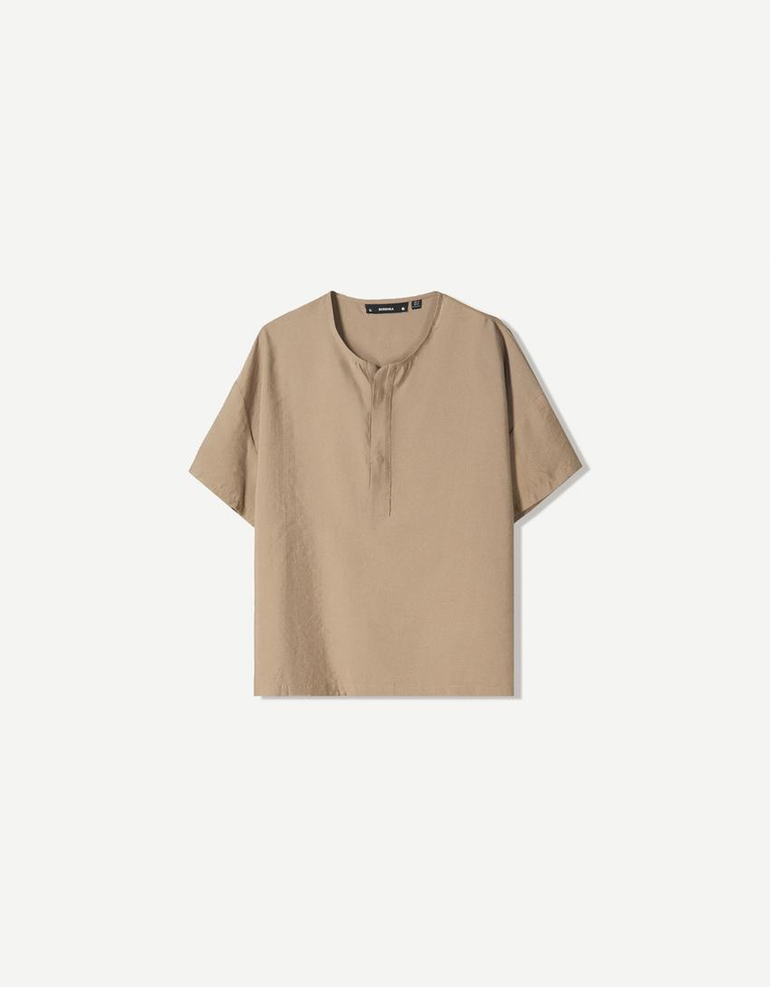 Oversized soepelvallende blouse met korte mouw-Zand-4