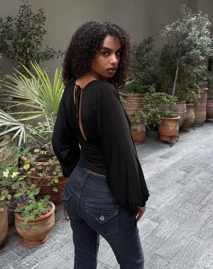 توب بأكمام طويلة وزمزمة-أسود