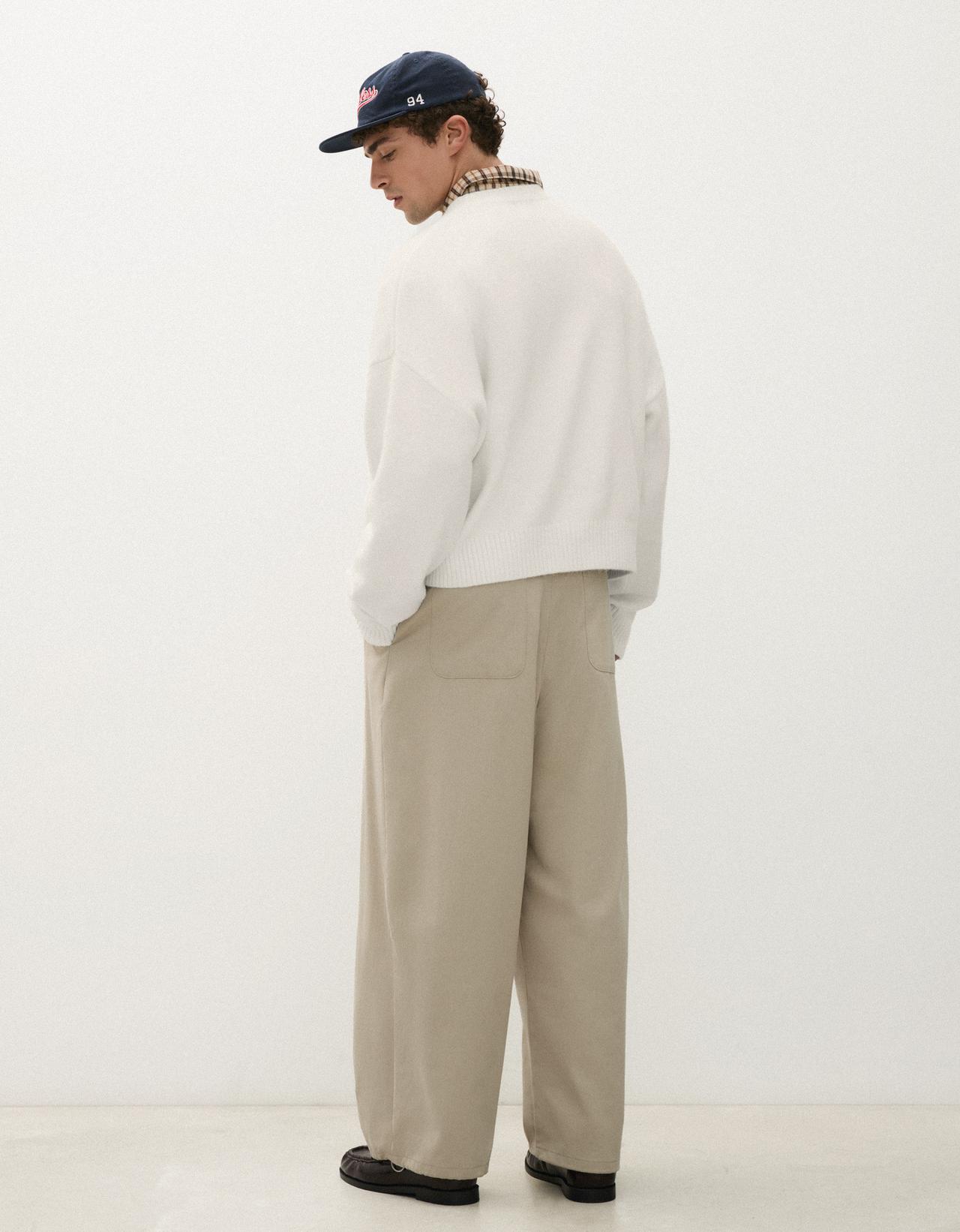 Cross-over pleat baggy trousers — Sand