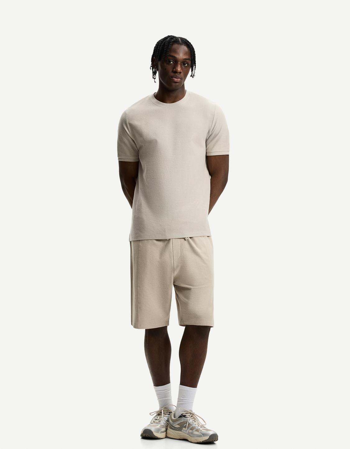 T-shirt and Bermuda shorts set