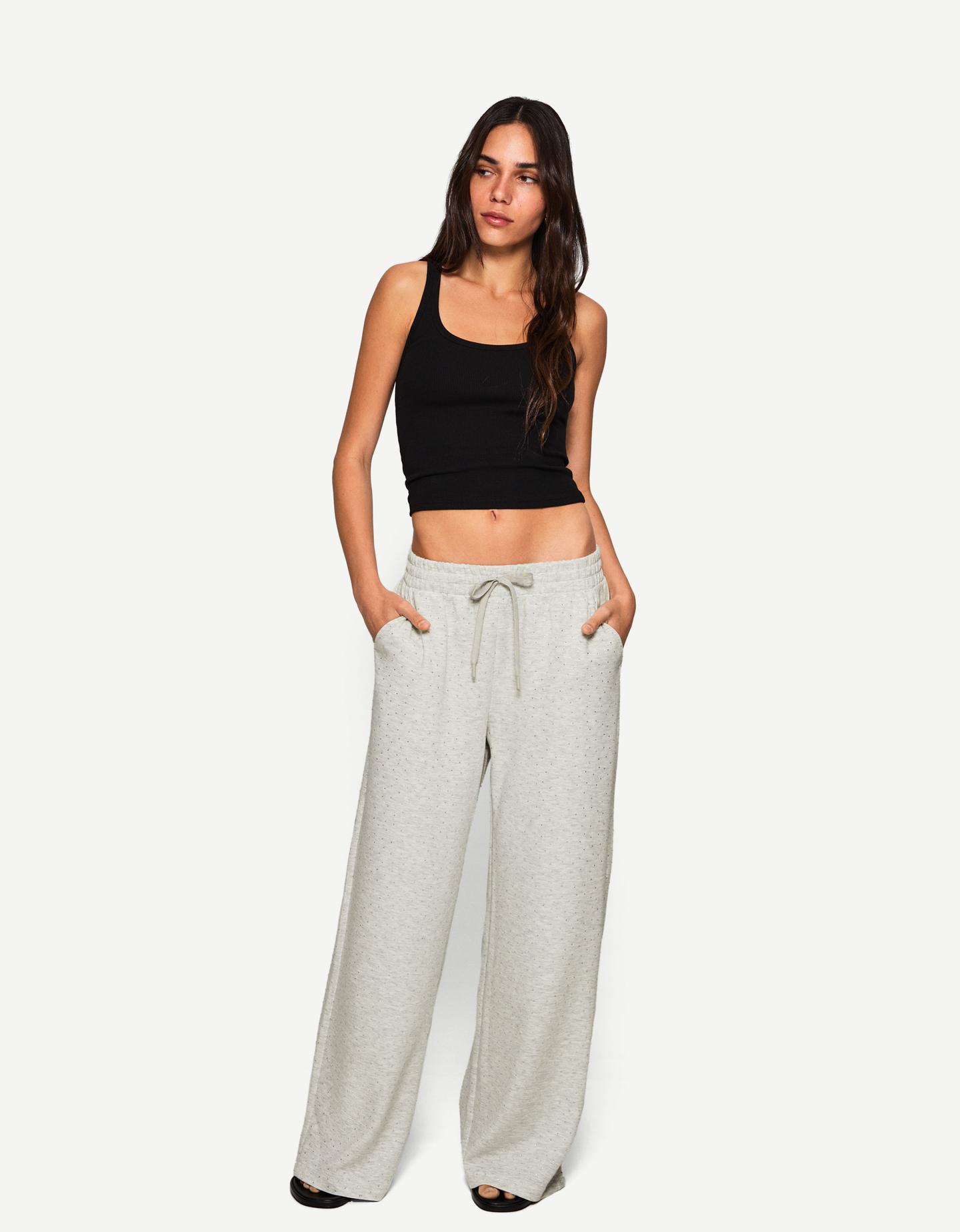 Bershka błyszczące spodnie z szerokimi nogawkami szary