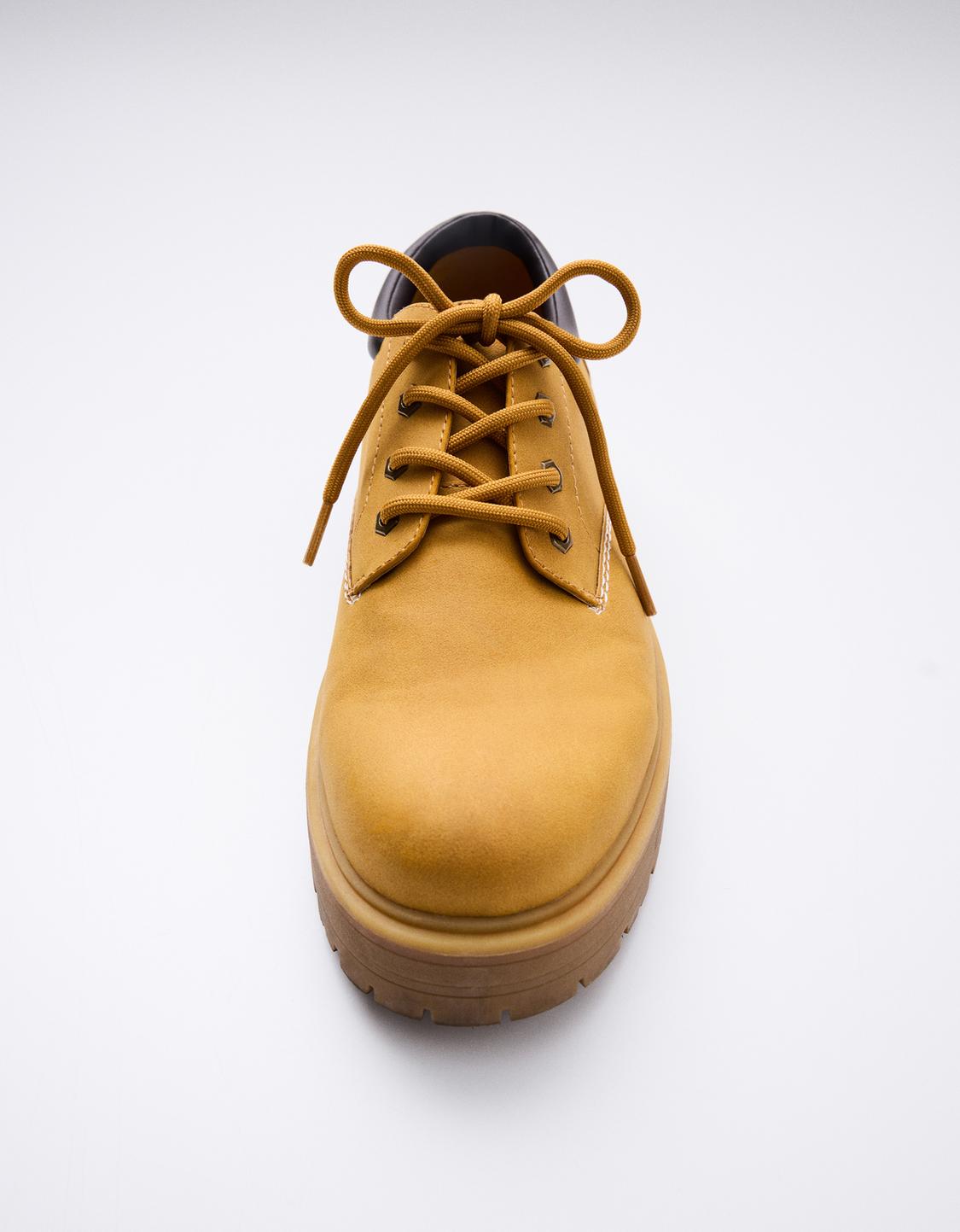 Shoes with quilted detail