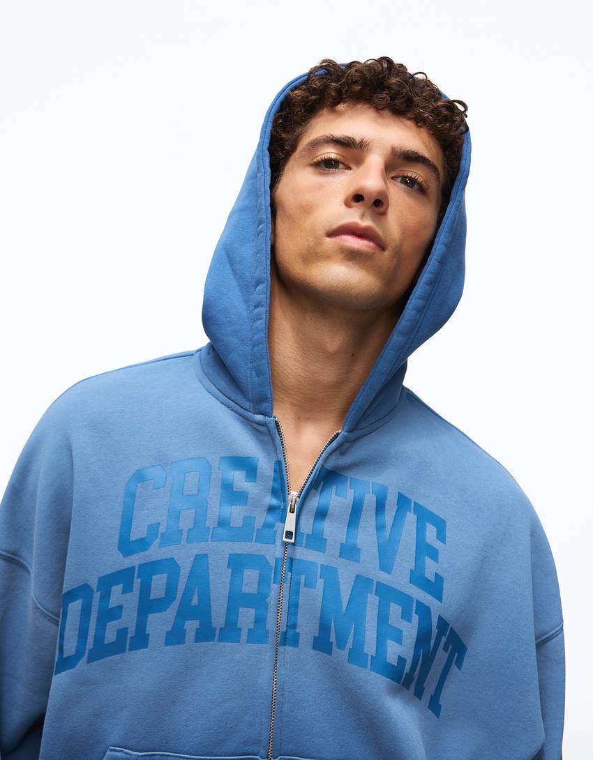Hoodie in Washed-Optik mit Print-Blau