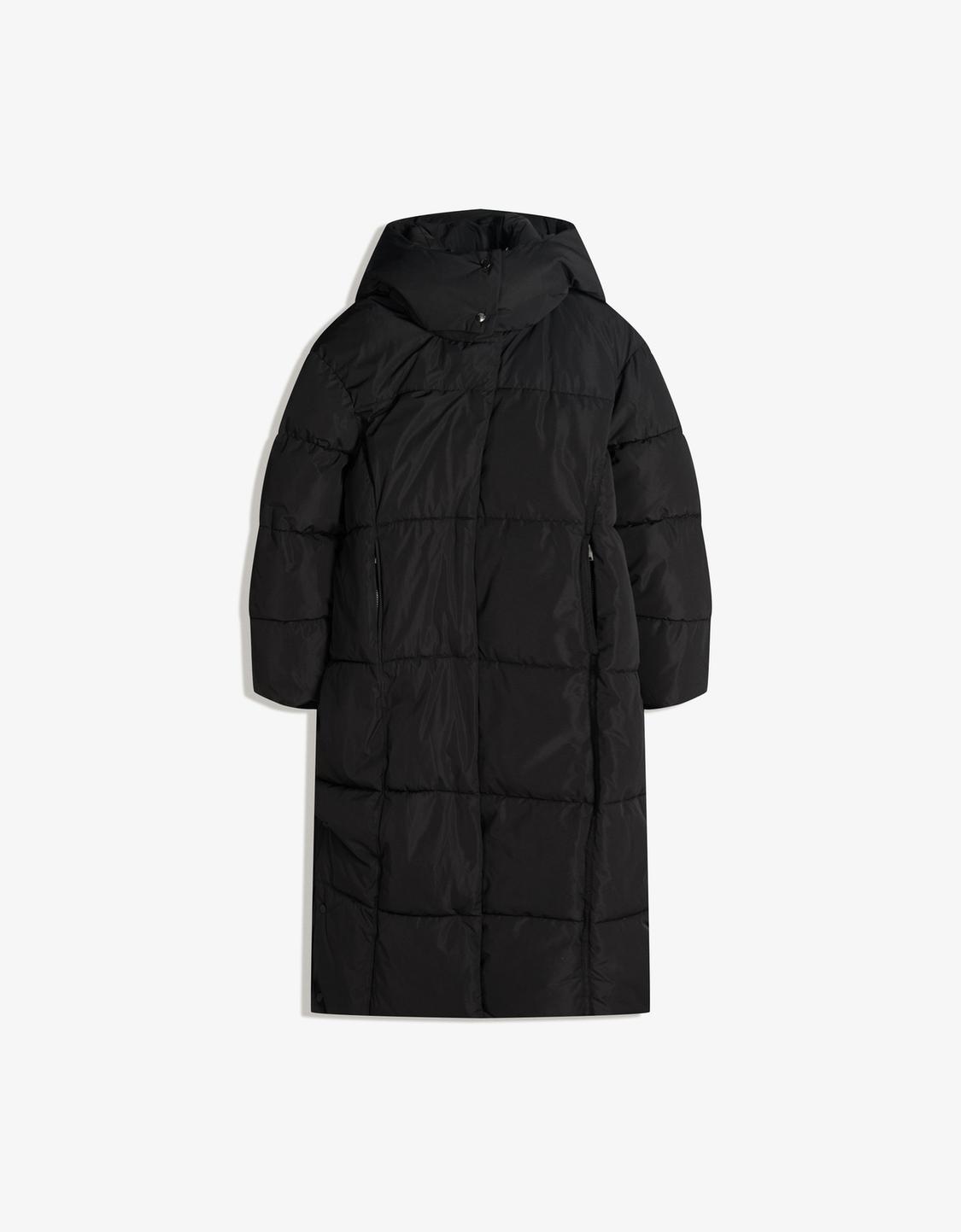 Длинное стеганое пальто с капюшоном