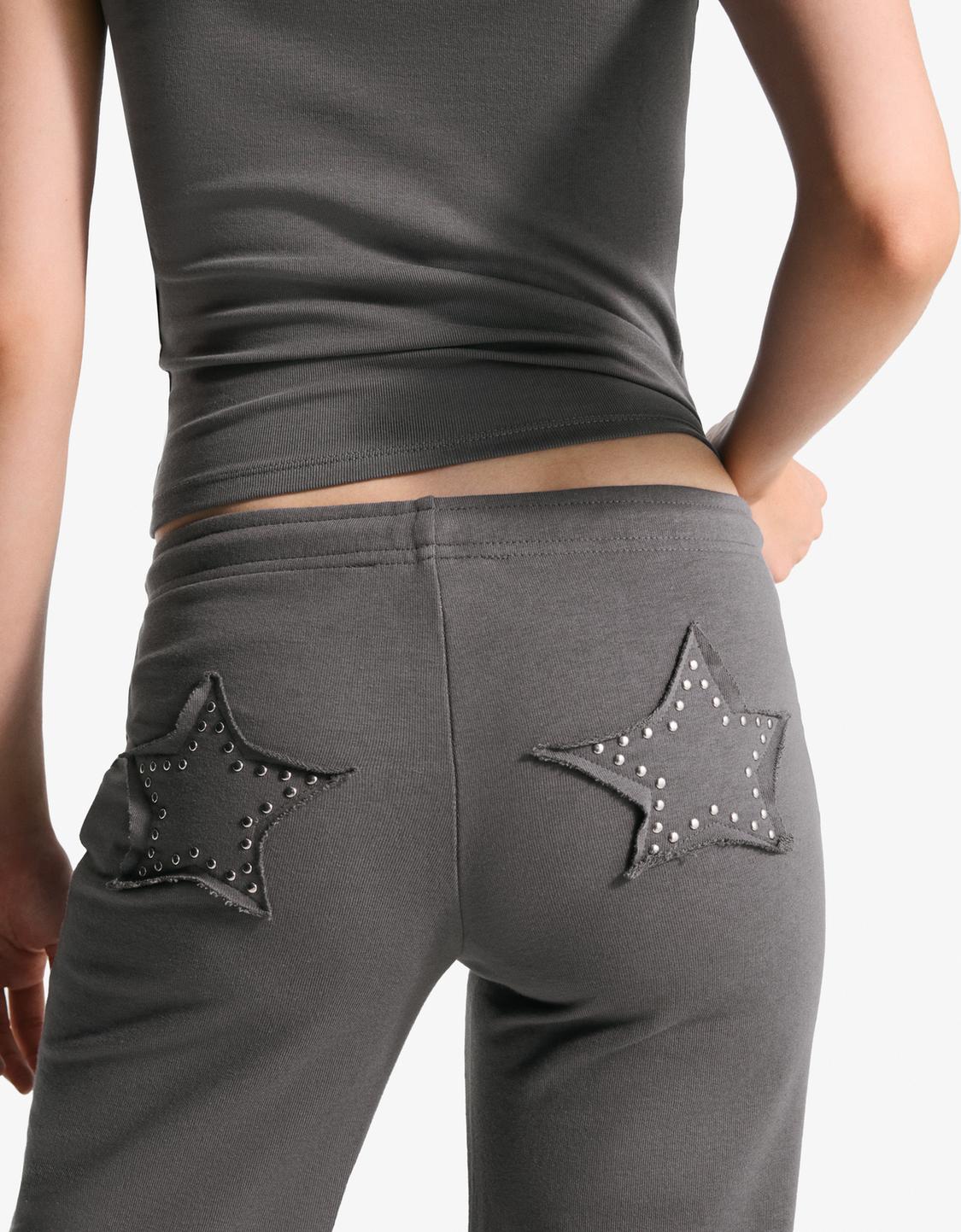 Plush trousers with studs