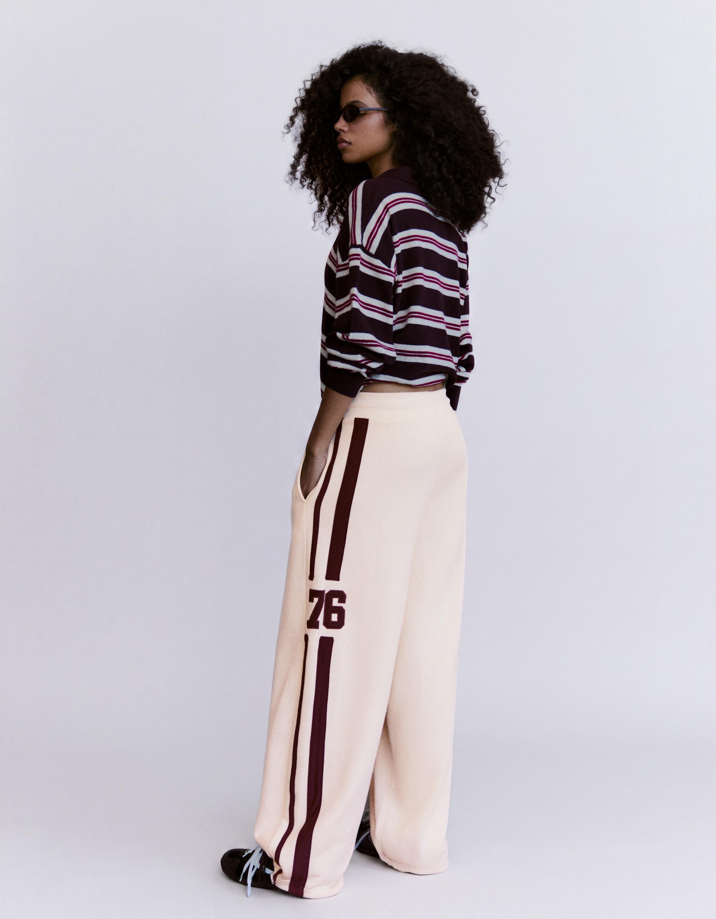 Embroidered wide-leg plush trousers — Cream