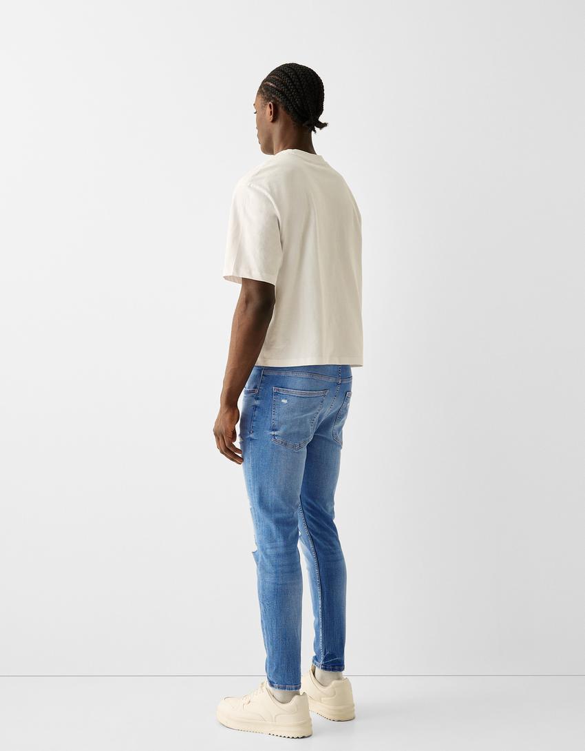 Jeans skinny fit rasgões salpicos-Azul lavado-2
