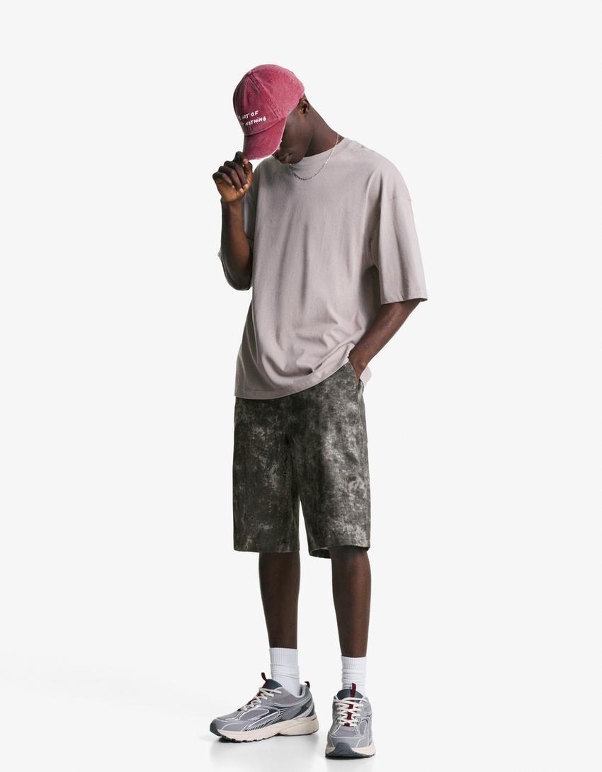 Bermuda mit Print-Schwarz