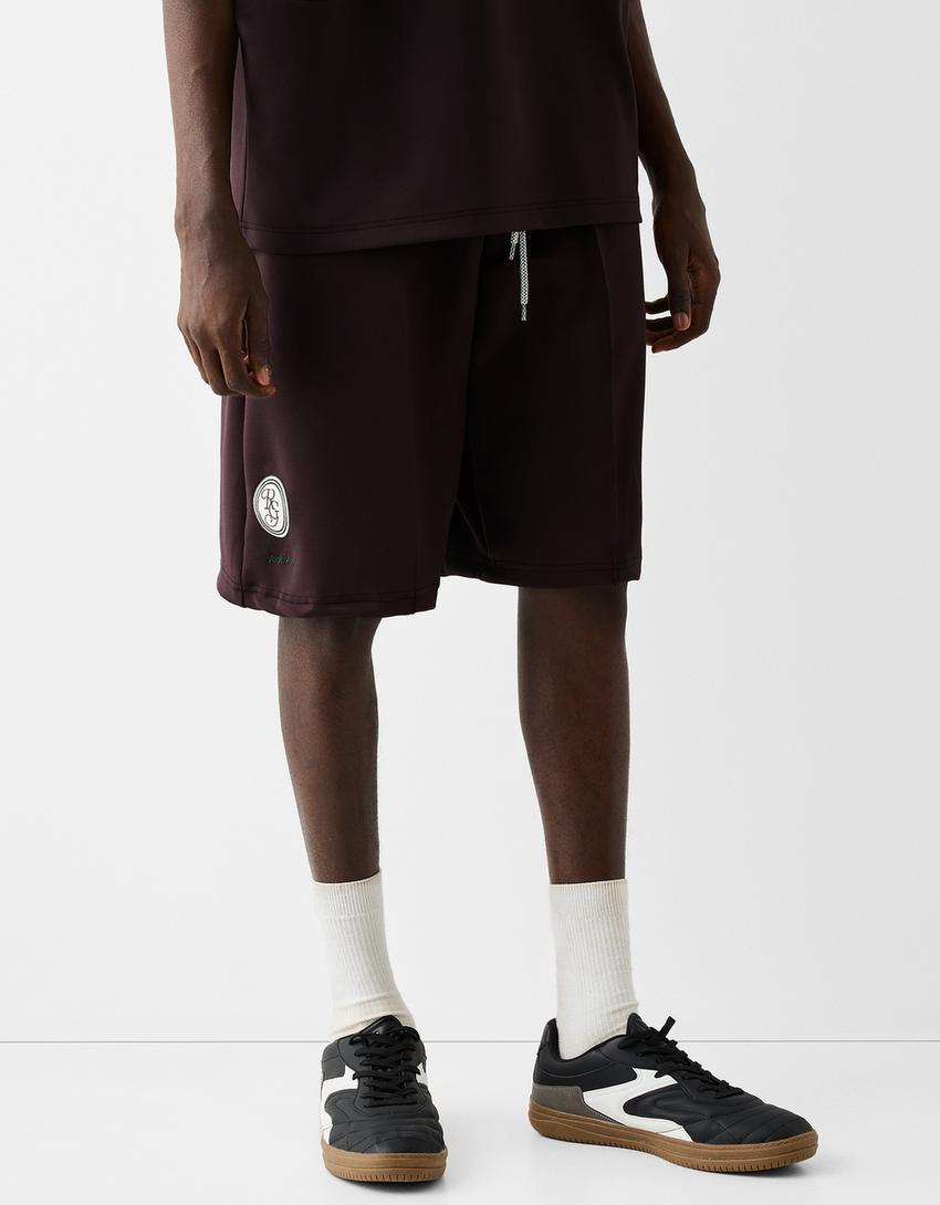 شورت برمودا رياضي بطبعة-بني-1