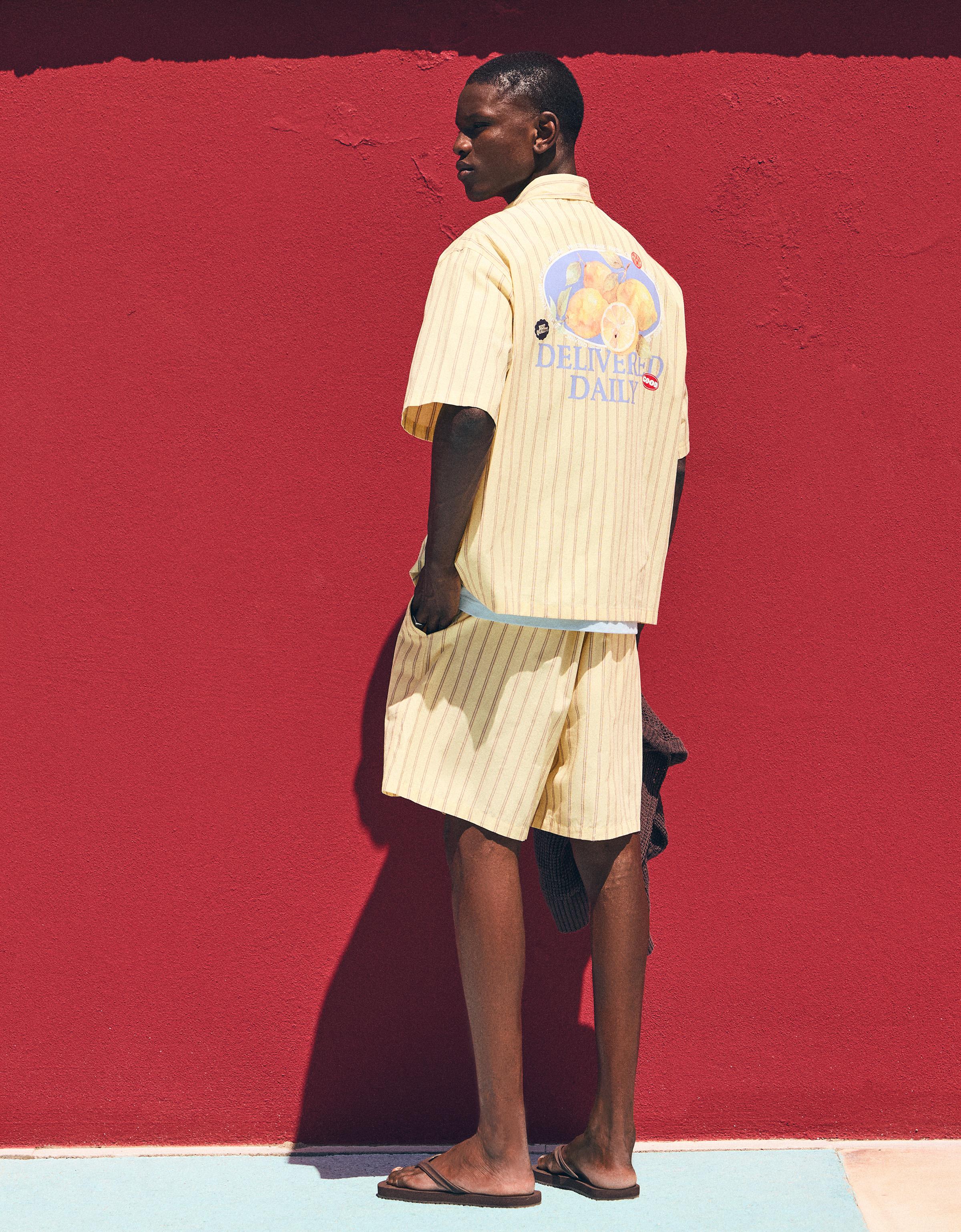 Elastic waist stripe Bermuda shorts — Yellow