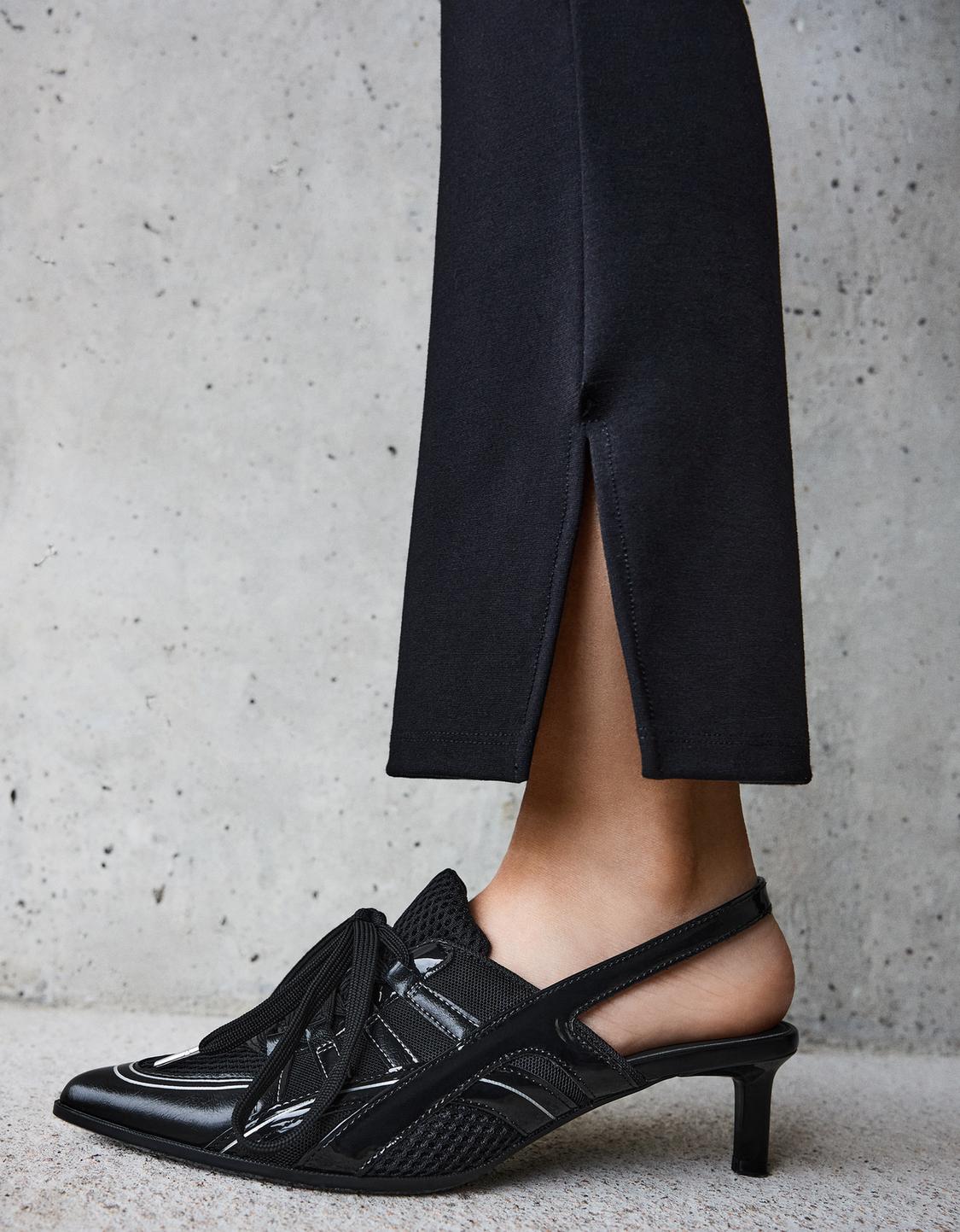 Slingback high-heel football shoes