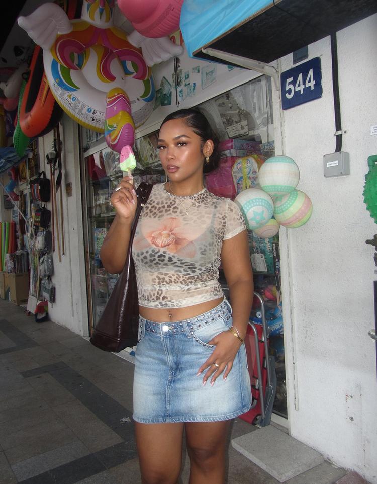 Zımbalı mini denim etek