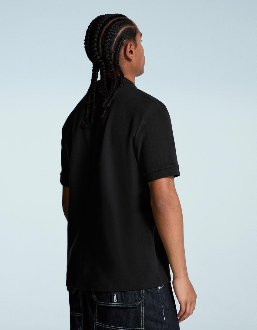 Polo manches courtes structure brodée-Noir