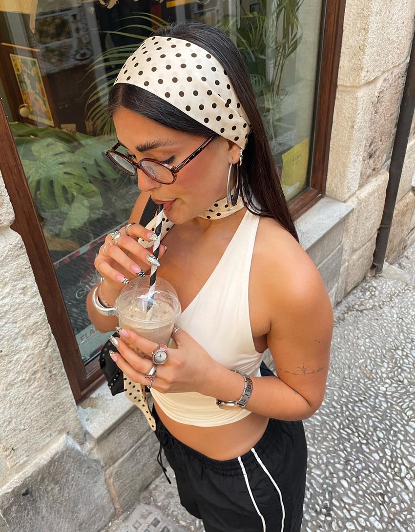 Täpiline kaelarätt-Kreemikas