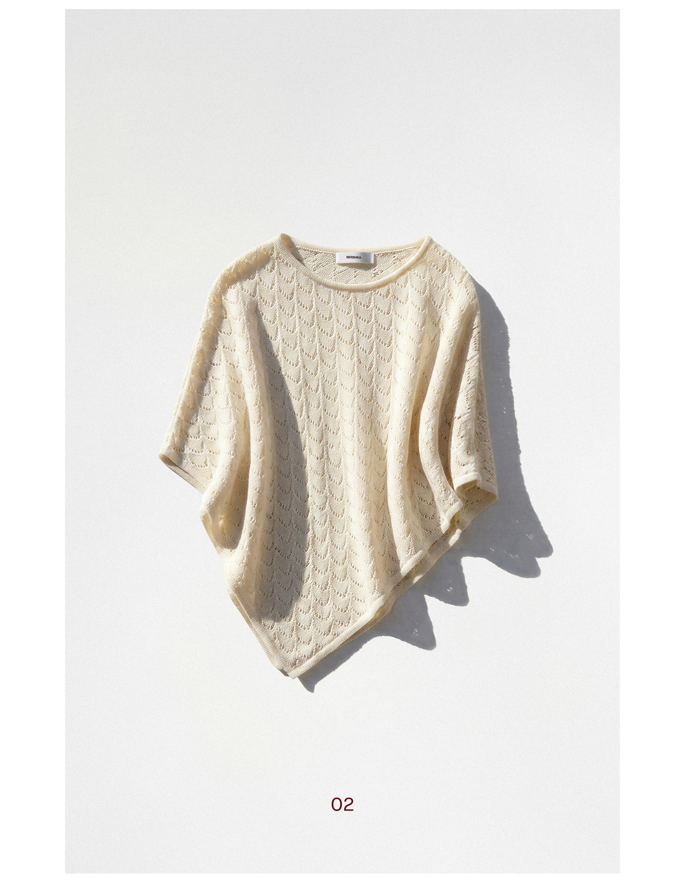 Asymmetric crochet cape — Cream
