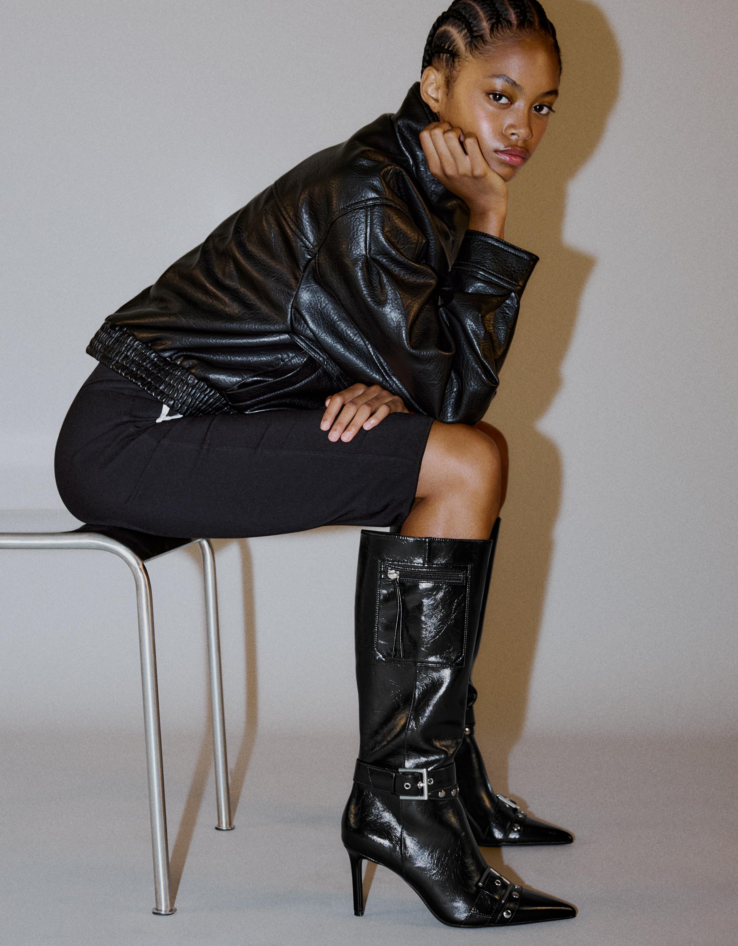 Heeled boots with buckle detail — BLACK