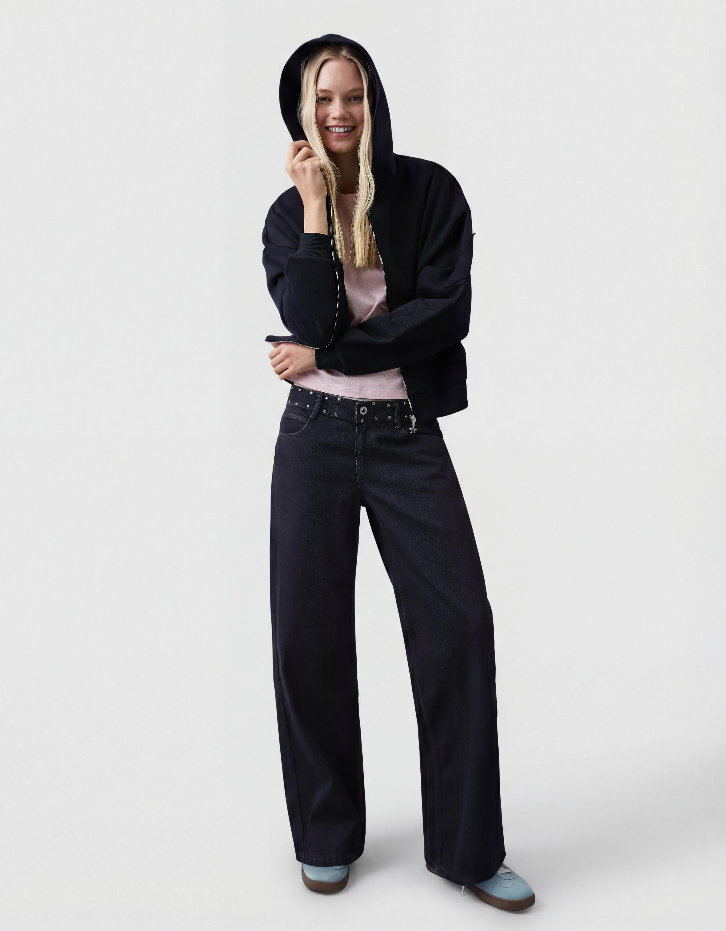 Low-rise baggy studded jeans