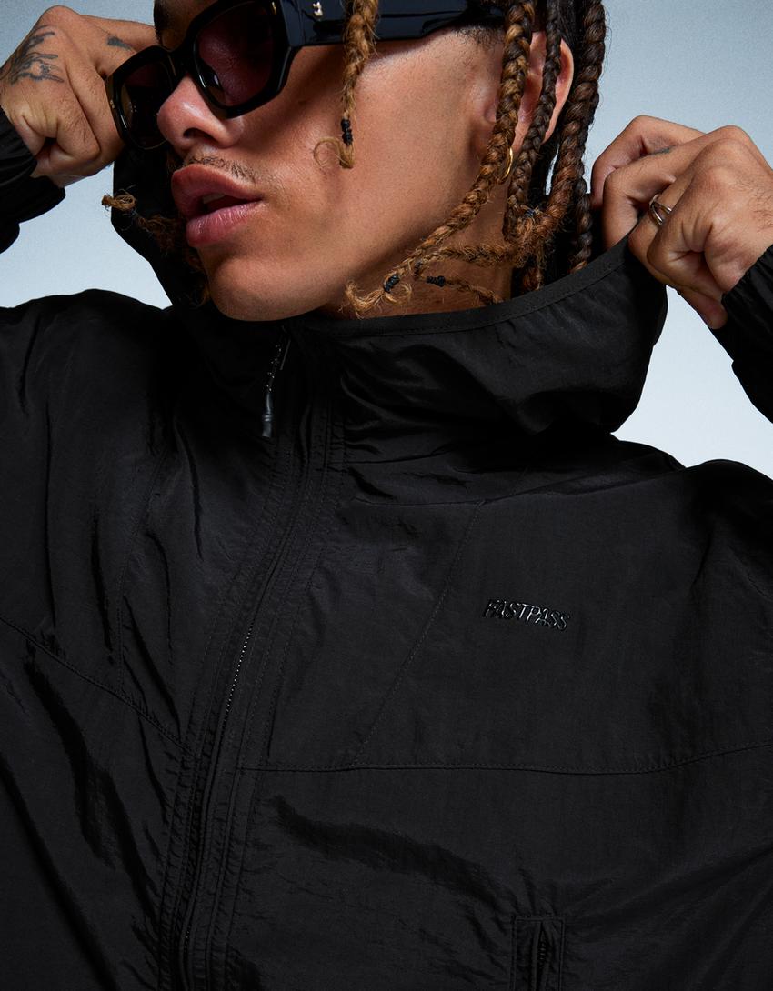 Hooded technical jacket