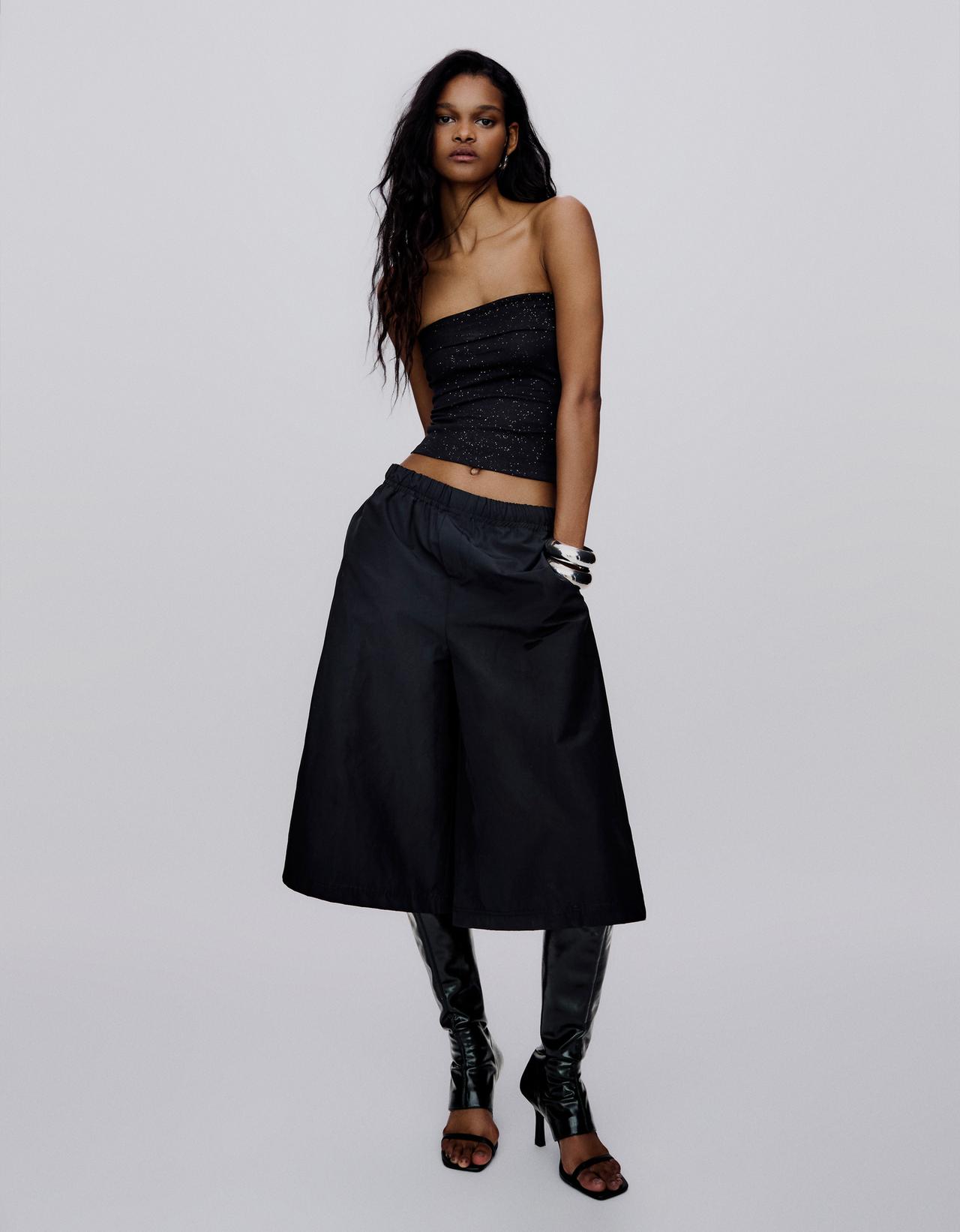 Shimmery bandeau top — Black