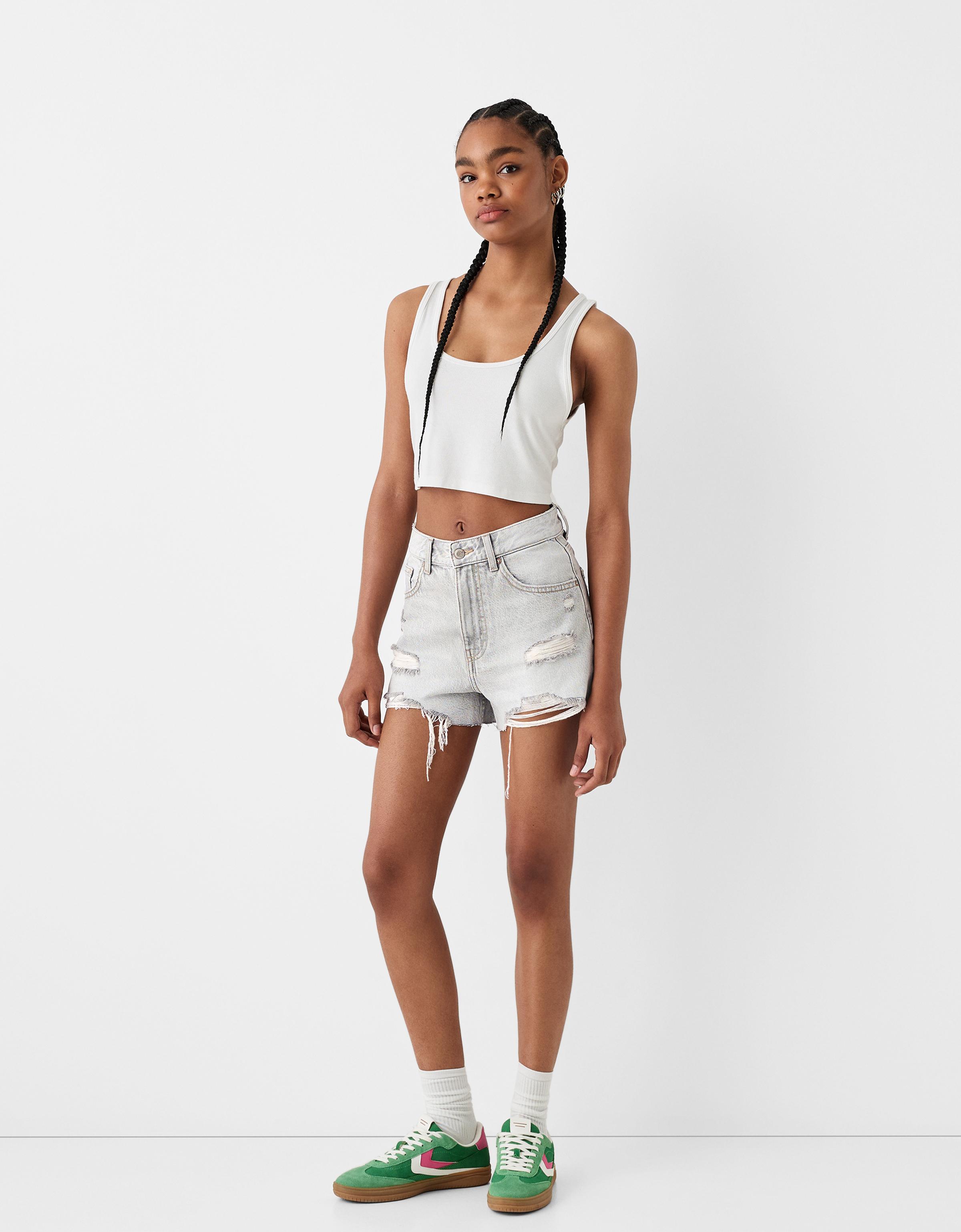 Short fashion jean dechire femme