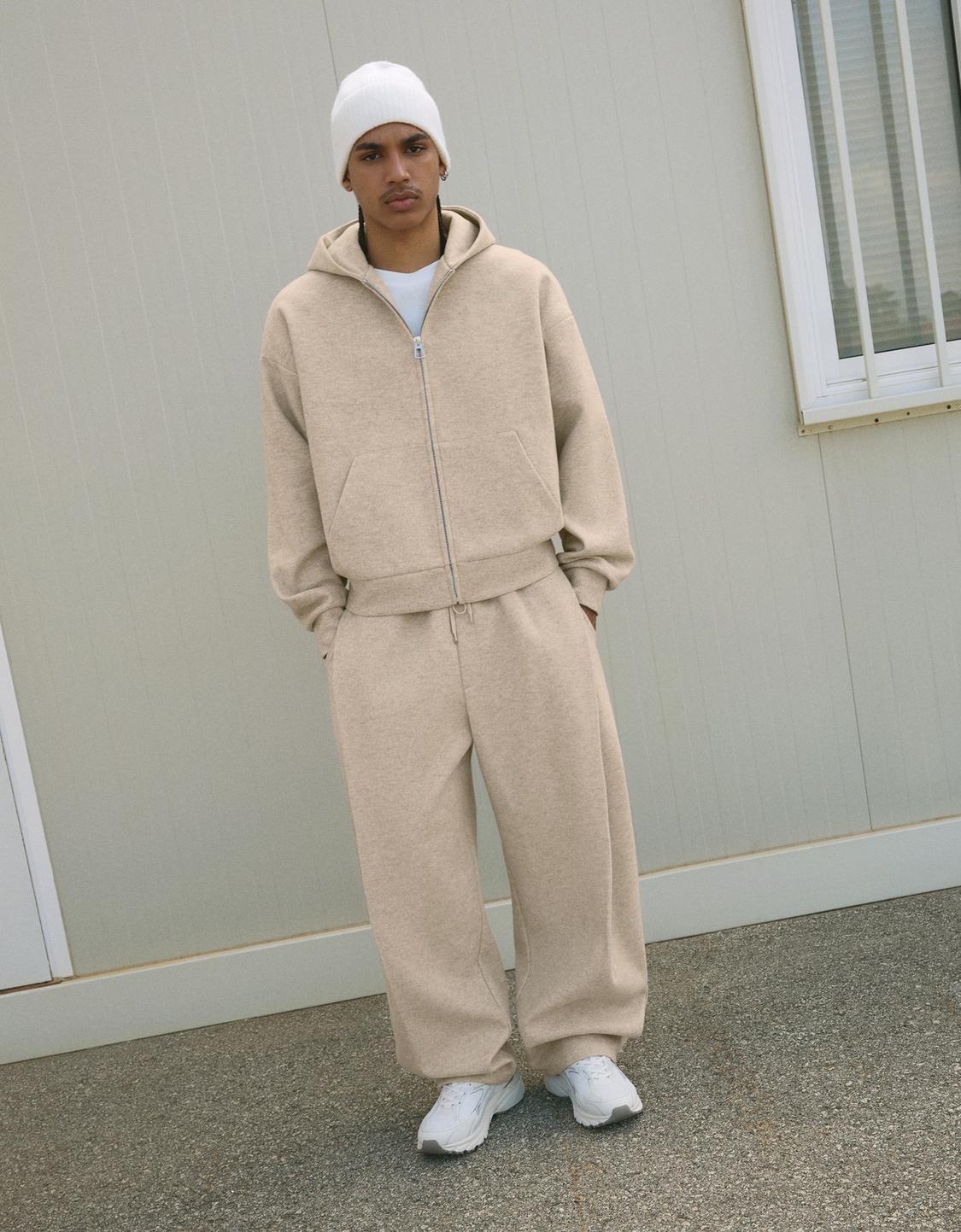 Balloon fit felt texture trousers with darts