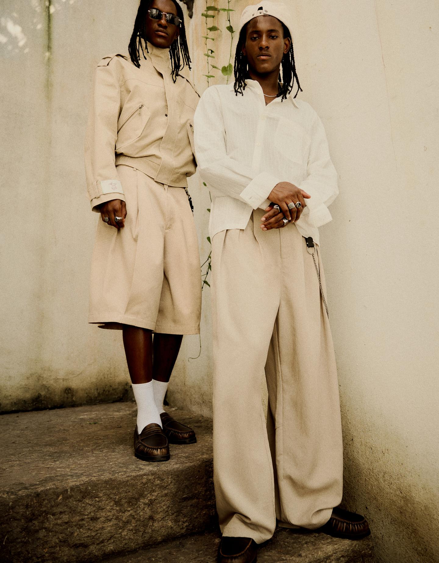 Bershka spodnie o kroju super baggy z zakładkami piaskowy