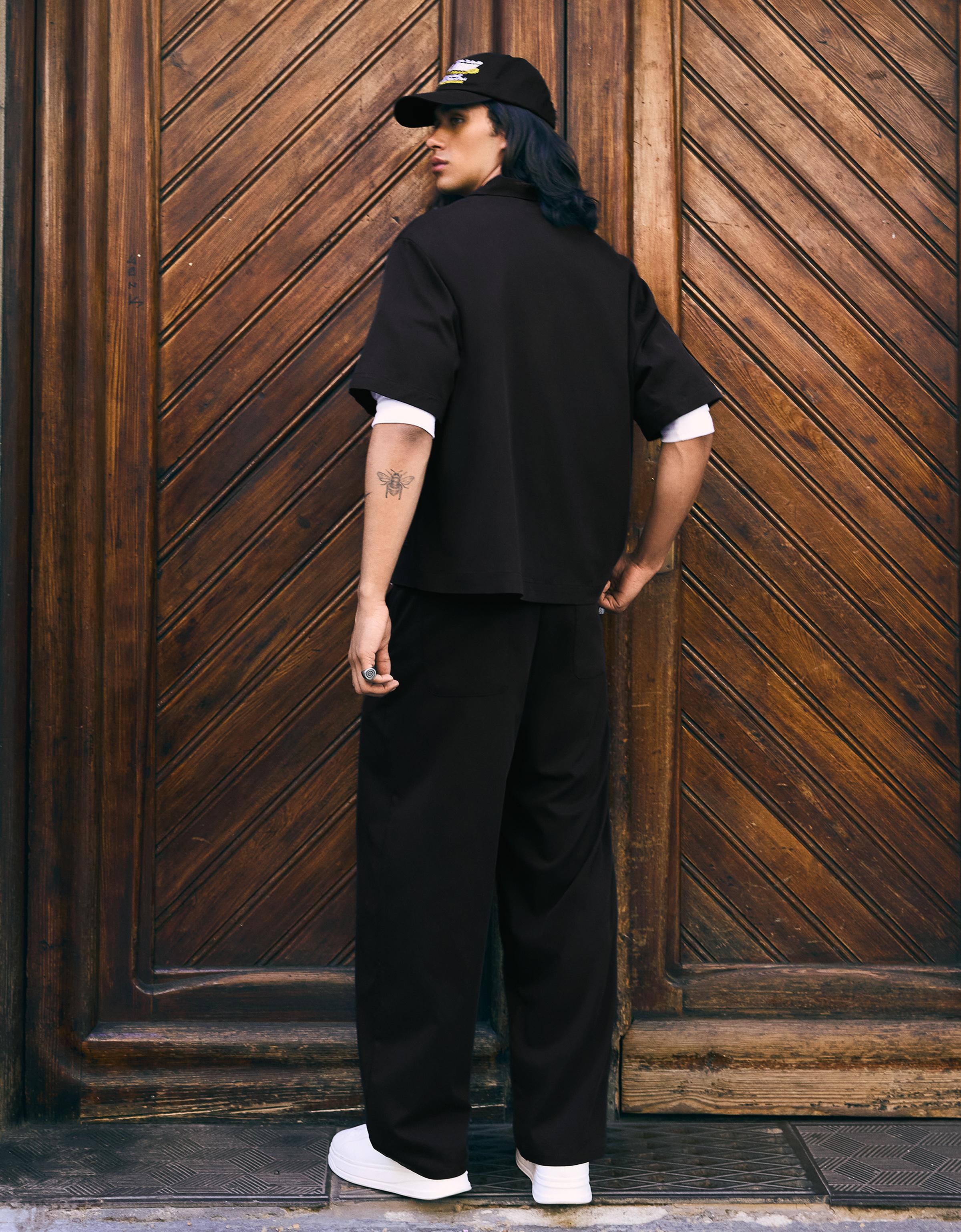 Super baggy fluid trousers with darts — Black