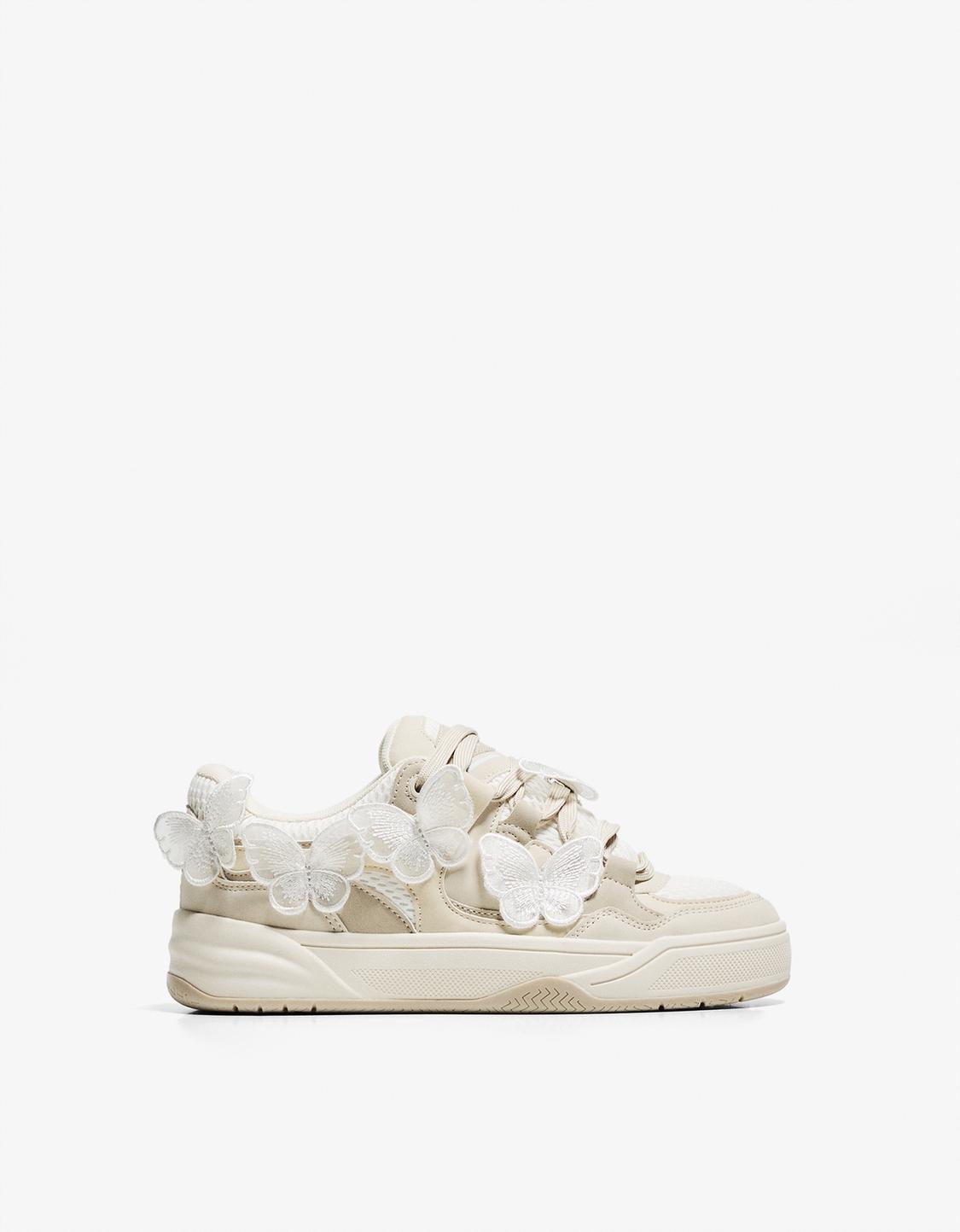 Skater trainers with butterfly details